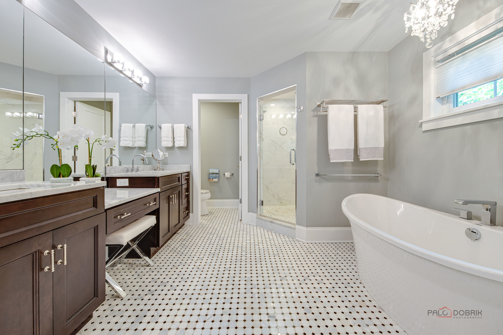 192 Gage Road Riverside, IL 60546 - Photo 27 of 56 a spacious bathroom with a double vanity sink a mirror and a bathtub
