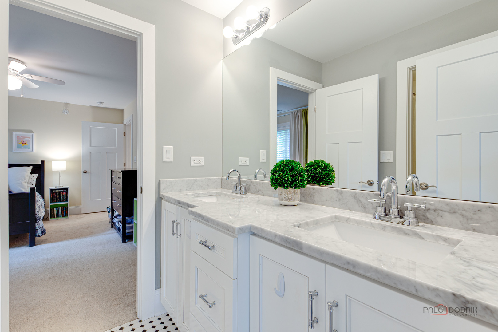 192 Gage Road Riverside, IL 60546 - Photo 33 of 56 a bathroom with double sink and a mirror