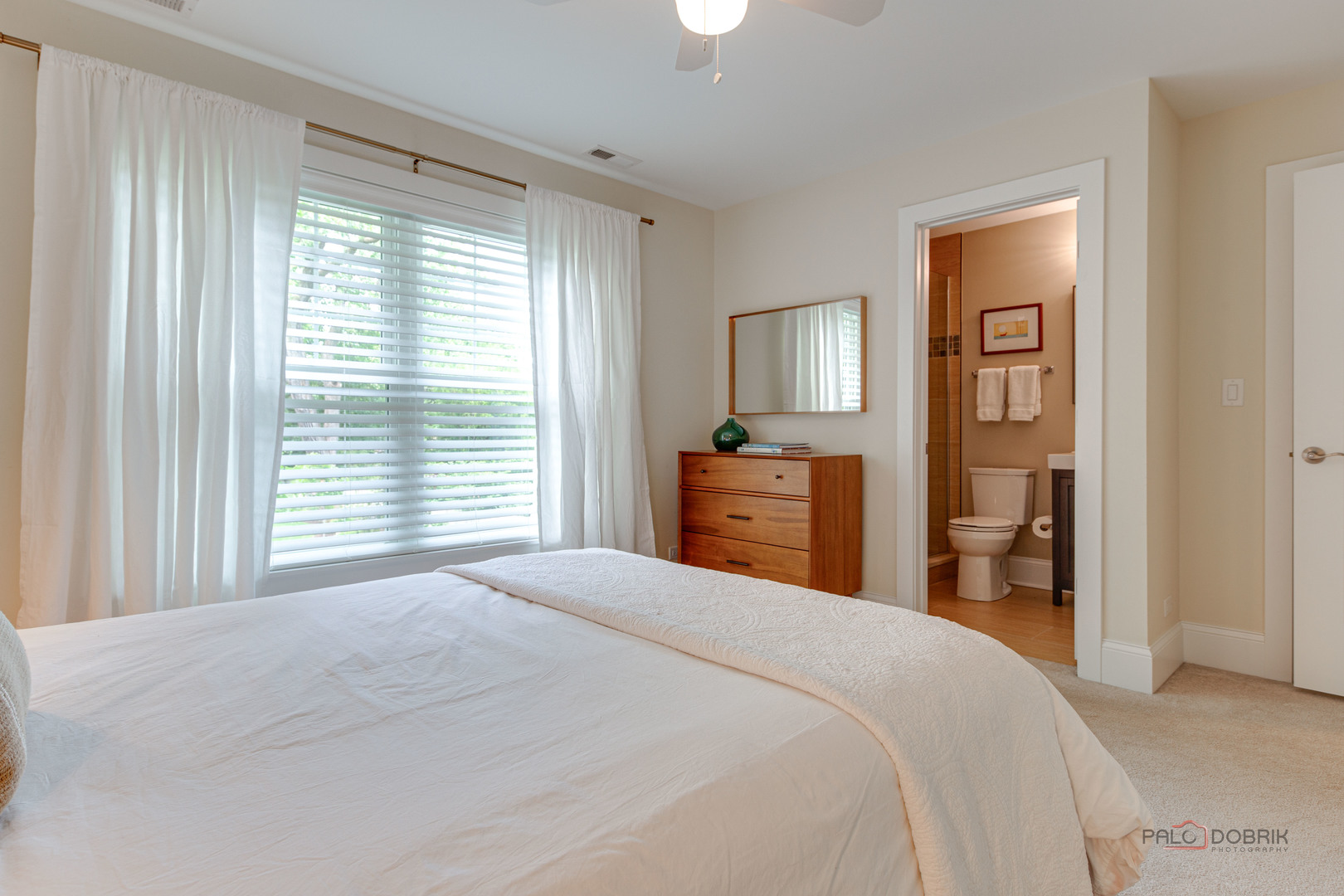 192 Gage Road Riverside, IL 60546 - Photo 37 of 56 a bedroom with a large bed and a tv