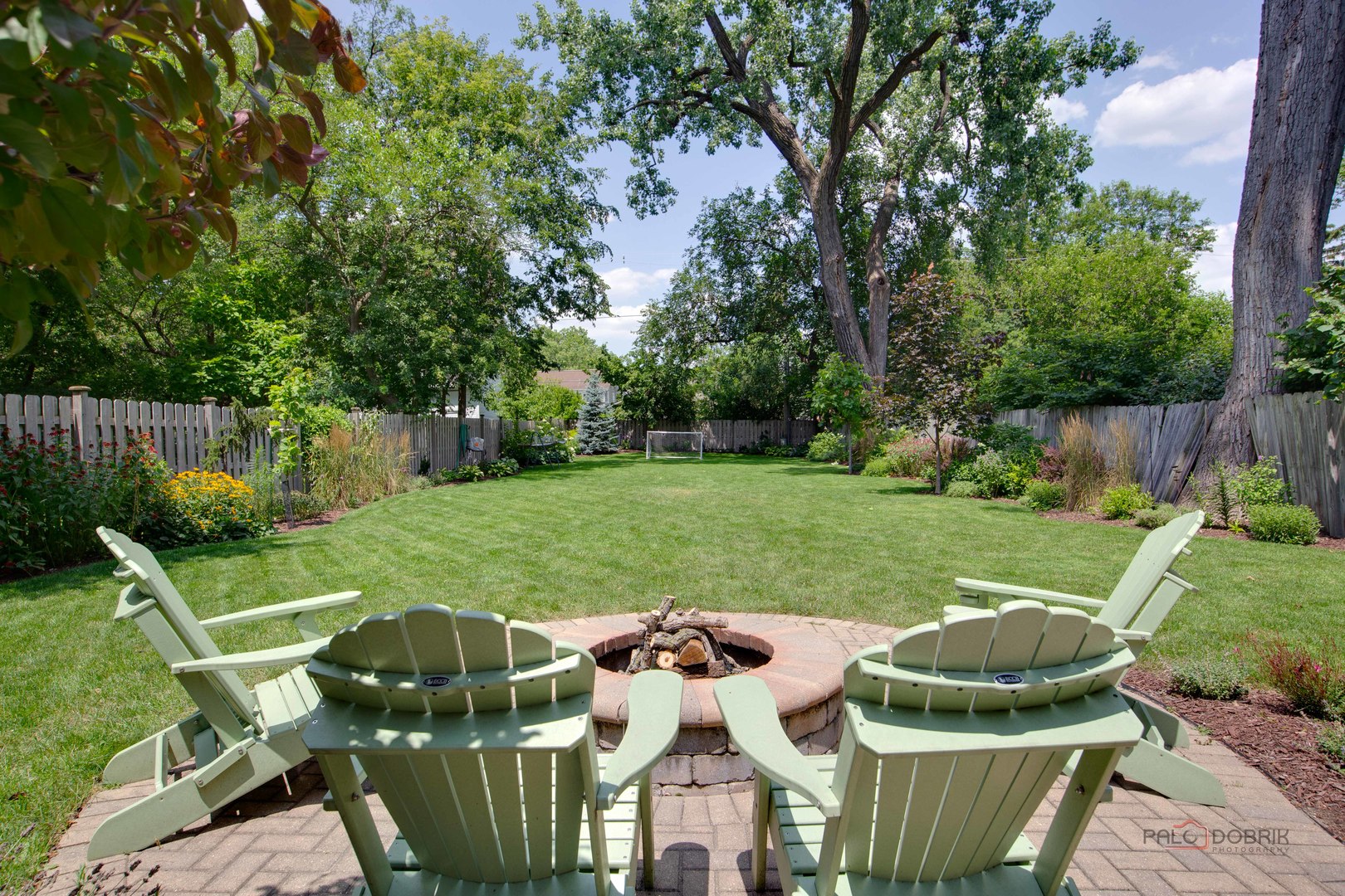 192 Gage Road Riverside, IL 60546 - Photo 51 of 56 a view of an house with backyard and outdoor seating