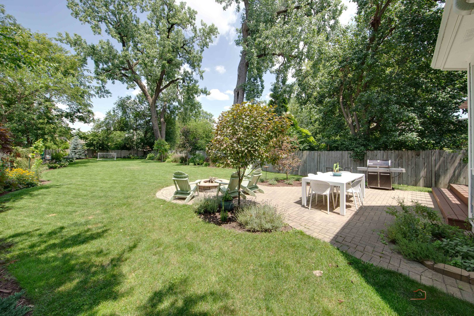192 Gage Road Riverside, IL 60546 - Photo 52 of 56 a view of backyard with a table and chairs
