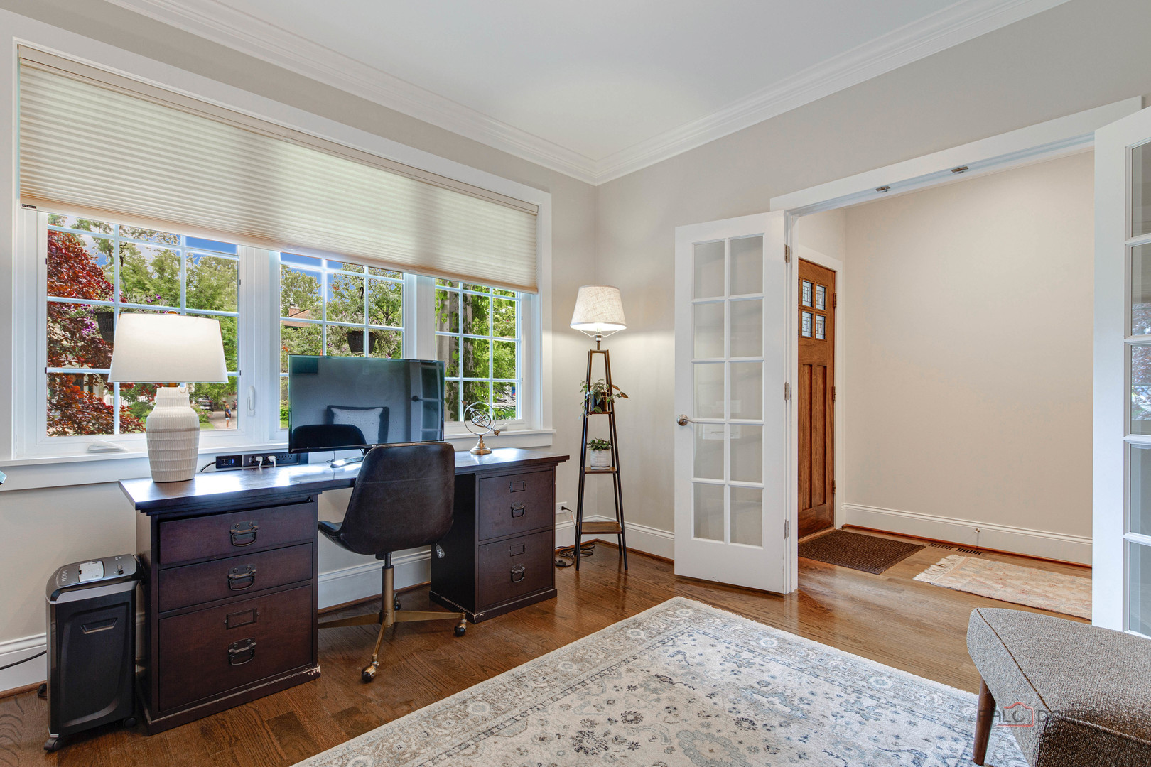 192 Gage Road Riverside, IL 60546 - Photo 8 of 56 a view of a workspace with furniture and a window