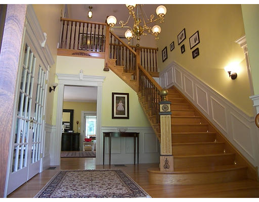52 Hardy Road, Unit 77 Bedford, NH 03110 - Photo 2 of 15 a view of entryway and hall with wooden floor