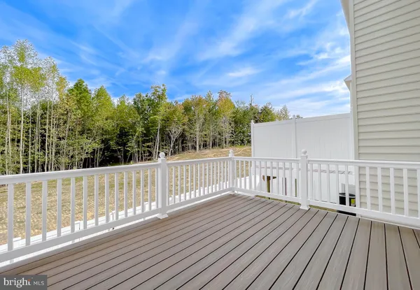 a view of balcony with wooden floor