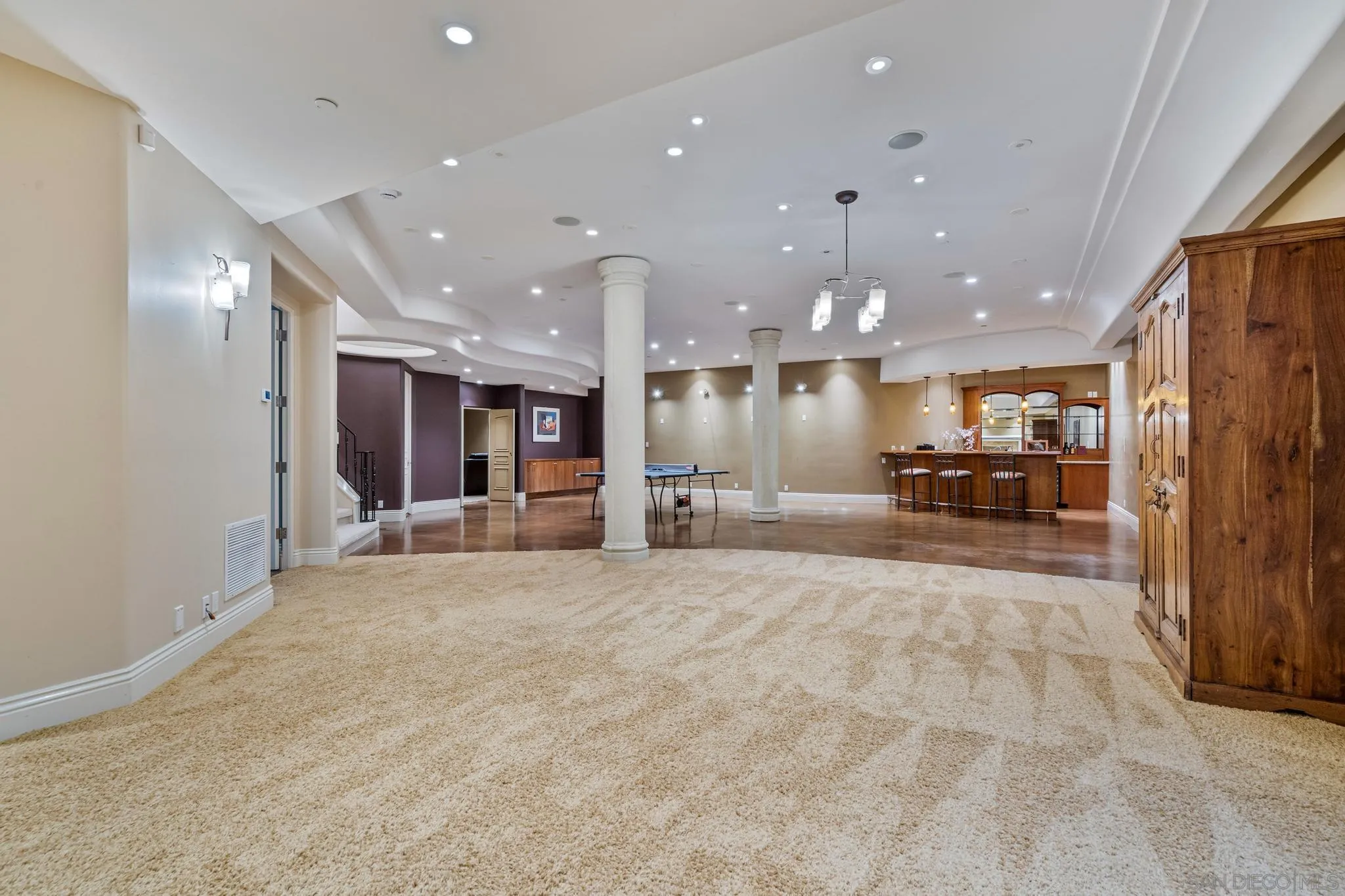 14380 Ciera Court Poway, CA 92064 - Photo 27 of 52 a view of a kitchen with a large window and chairs