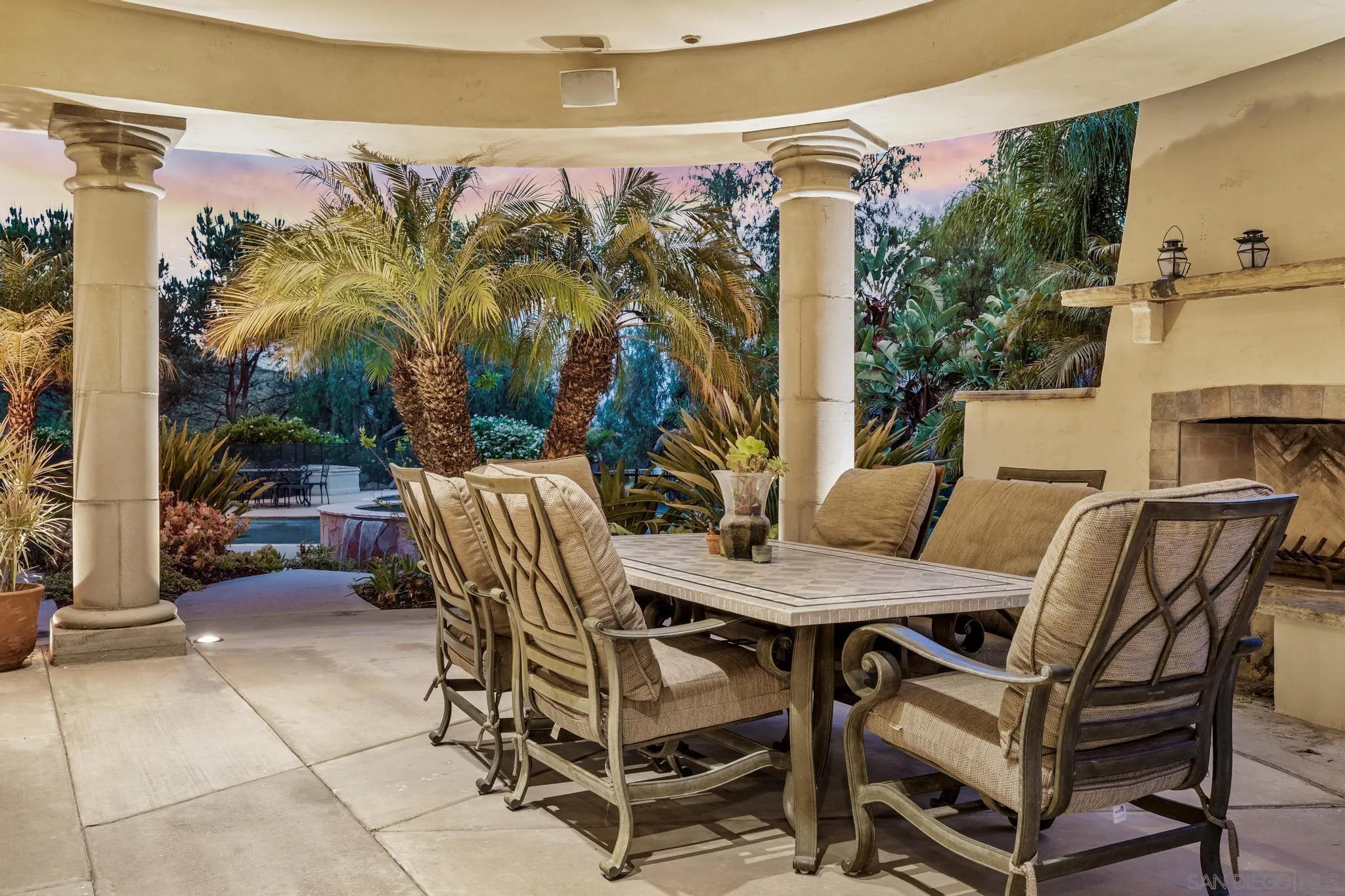 14380 Ciera Court Poway, CA 92064 - Photo 35 of 52 a view of a patio with table and chairs and potted plants