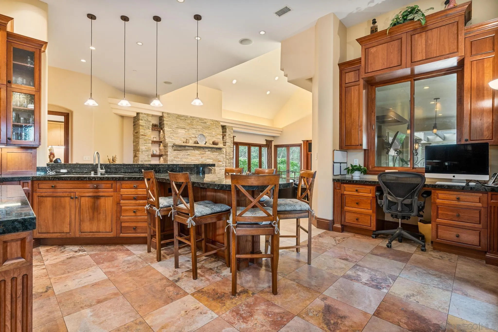 14380 Ciera Court Poway, CA 92064 - Photo 9 of 52 a open kitchen with a table and chairs in it