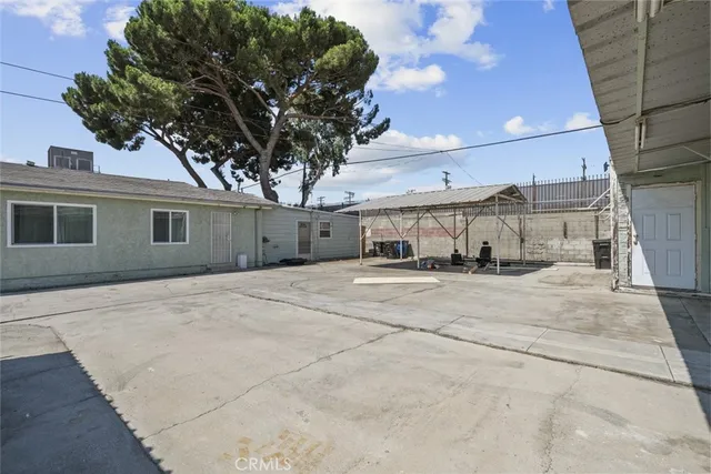a view of a parking space with garage