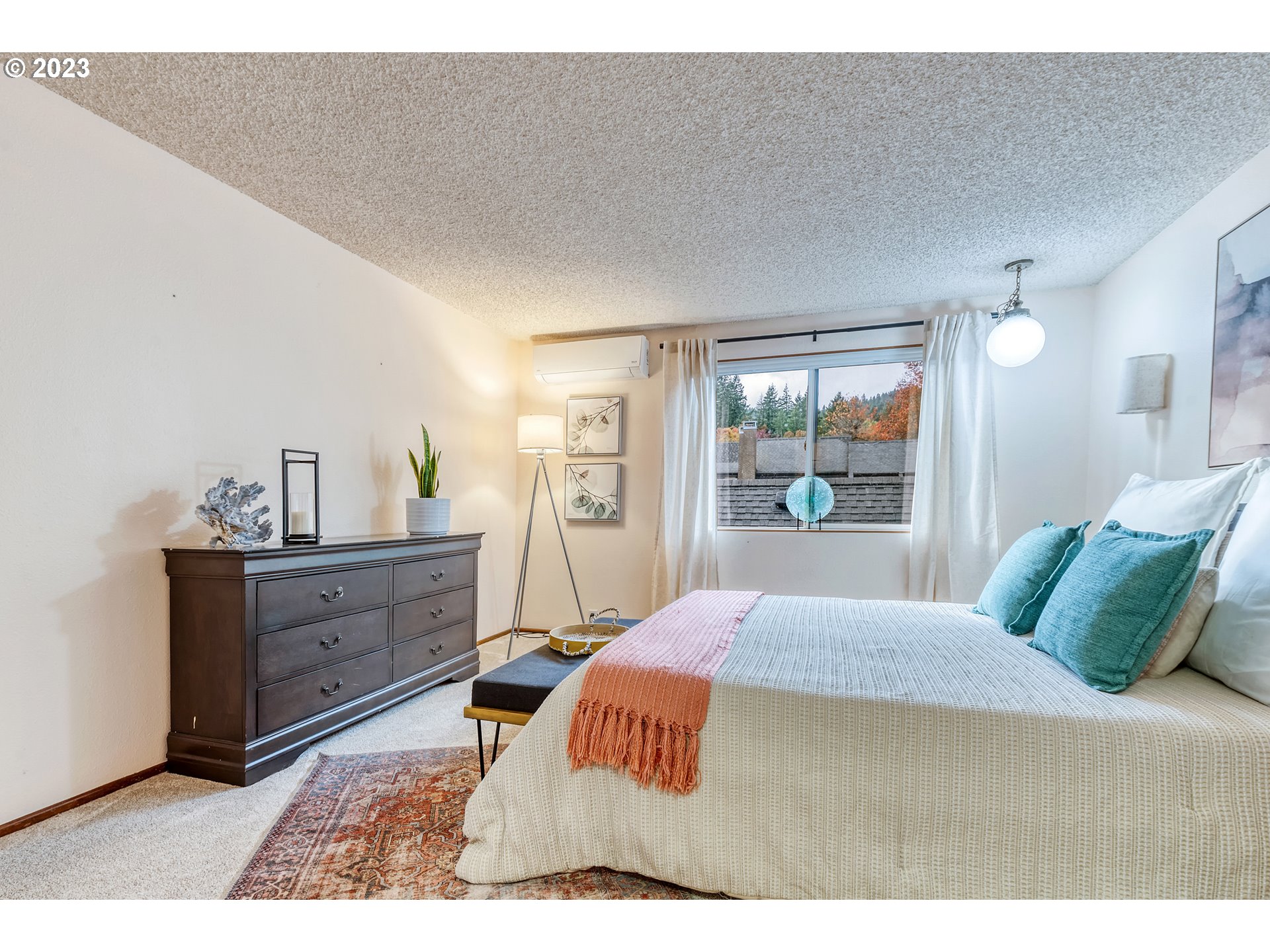 109 Westbrook Way Eugene, OR 97405 - Photo 17 of 36 a bedroom with a bed and a dresser