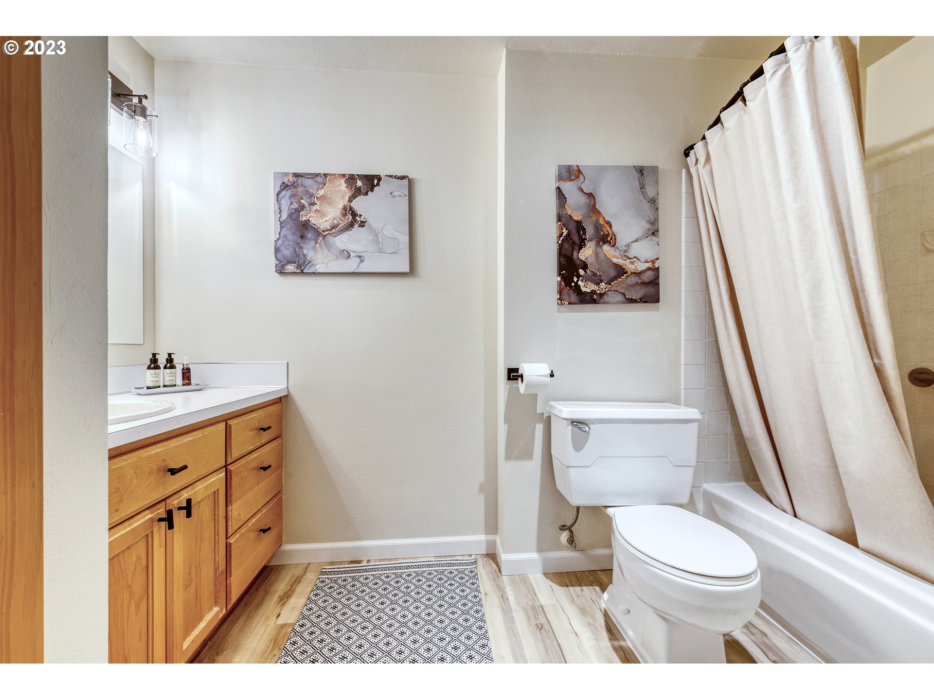 109 Westbrook Way Eugene, OR 97405 - Photo 20 of 36 a bathroom with a toilet sink and mirror