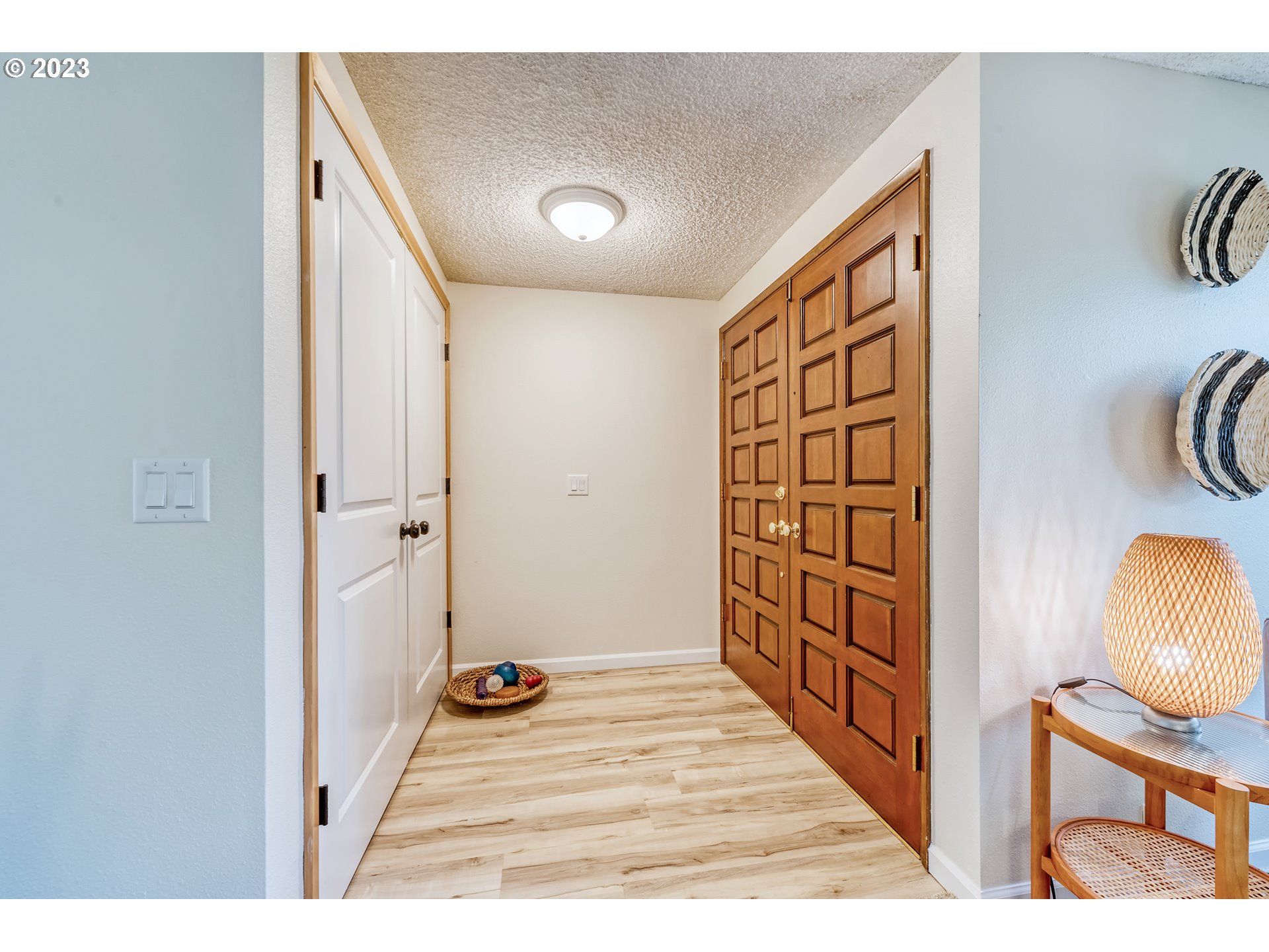 109 Westbrook Way Eugene, OR 97405 - Photo 5 of 36 a view of a hallway and wooden floor