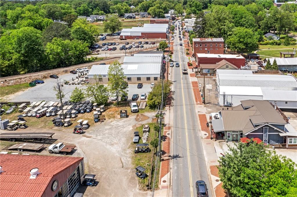 660 Groover Street Ball Ground, GA 30107 - Photo 42 of 53 an aerial view of a city
