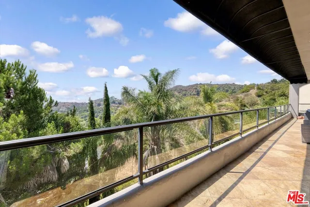 a view of a livingroom with furniture and window