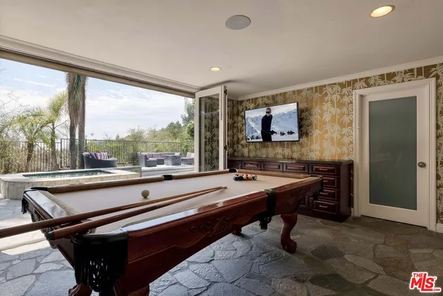 a view of room with window and furniture