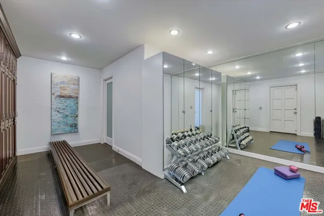 a living room with fireplace furniture and a window