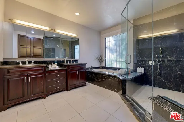 a living room with a couch and a large window