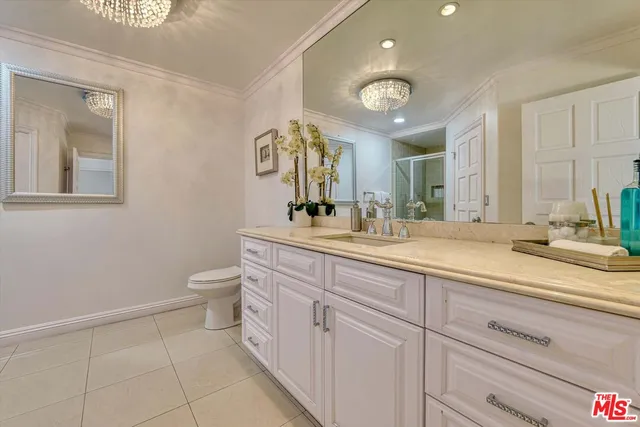 a bedroom with a bed and a fireplace