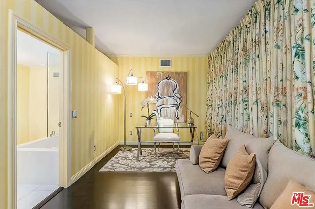 a bathroom with a shower sink and mirror
