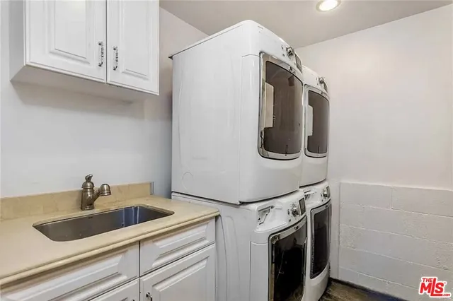 a view of a brick house with a large window