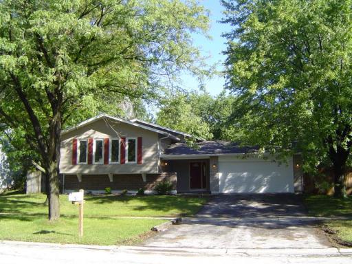 468 Rockhurst Road Bolingbrook, IL 60440 - Photo 1 of 1 a front view of a house with a garden