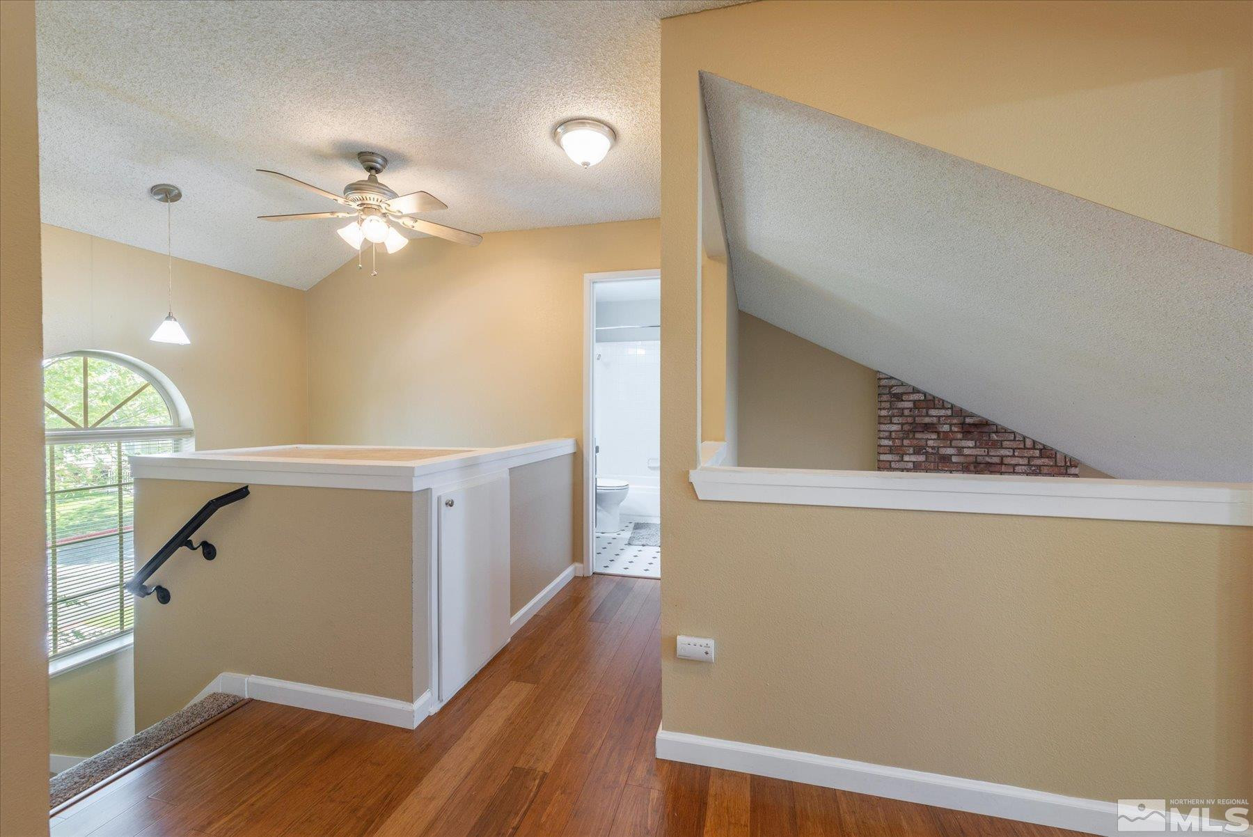 1910 Tuolumne Drive Reno, NV 89523 - Photo 20 of 36 a view of hallway with wooden floor