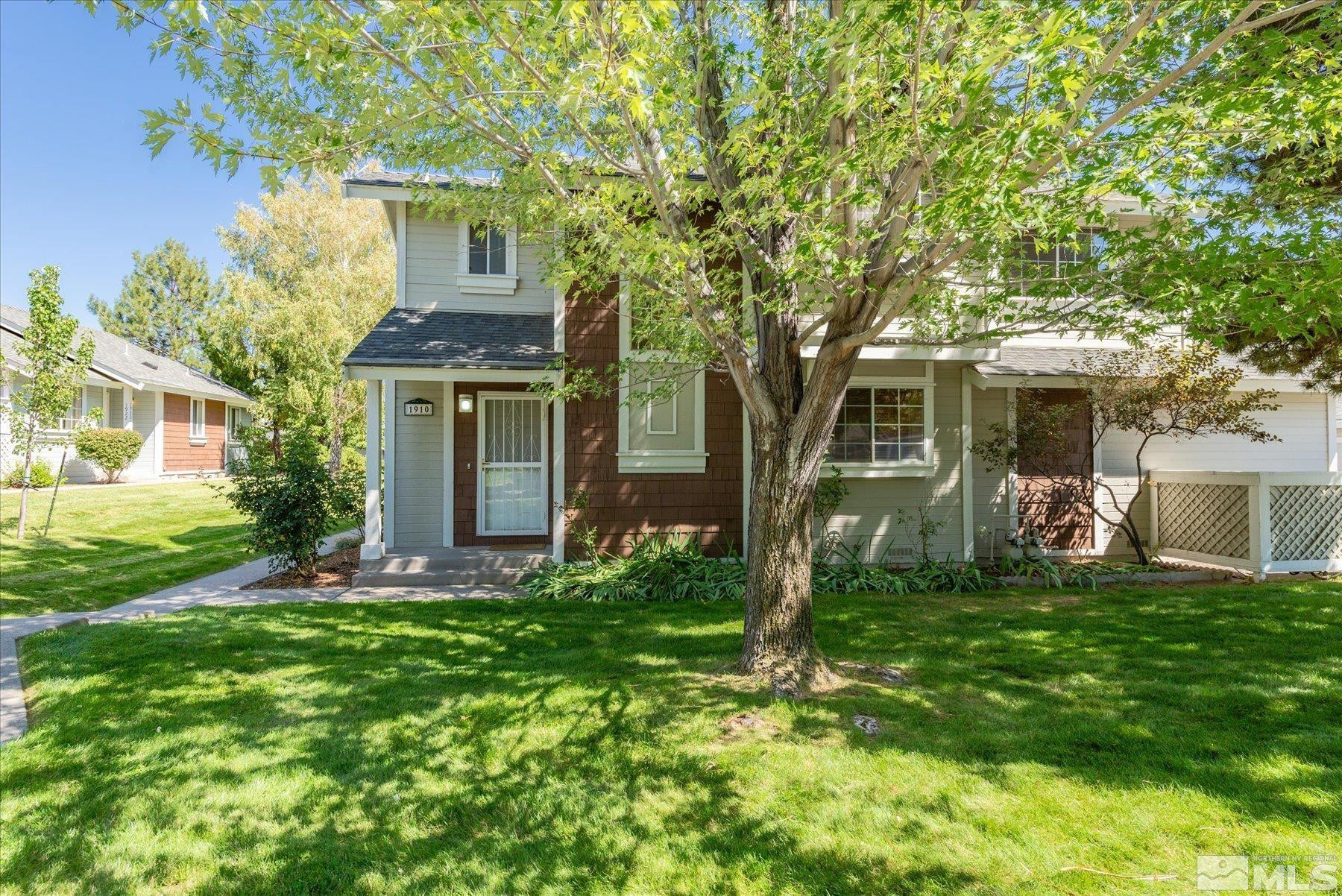 1910 Tuolumne Drive Reno, NV 89523 - Photo 2 of 36 a front view of house with yard and green space