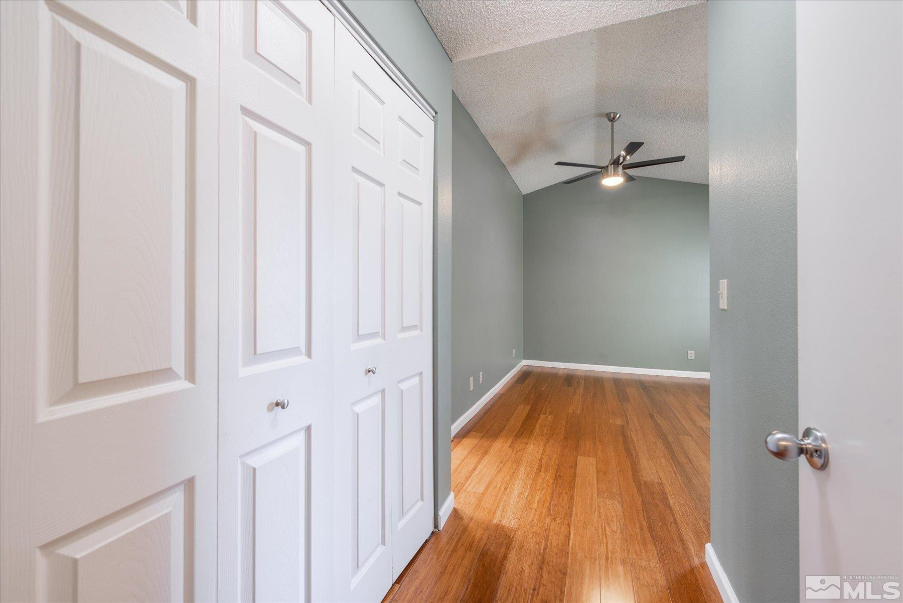 1910 Tuolumne Drive Reno, NV 89523 - Photo 24 of 36 a view of a hallway with wooden floor and staircase