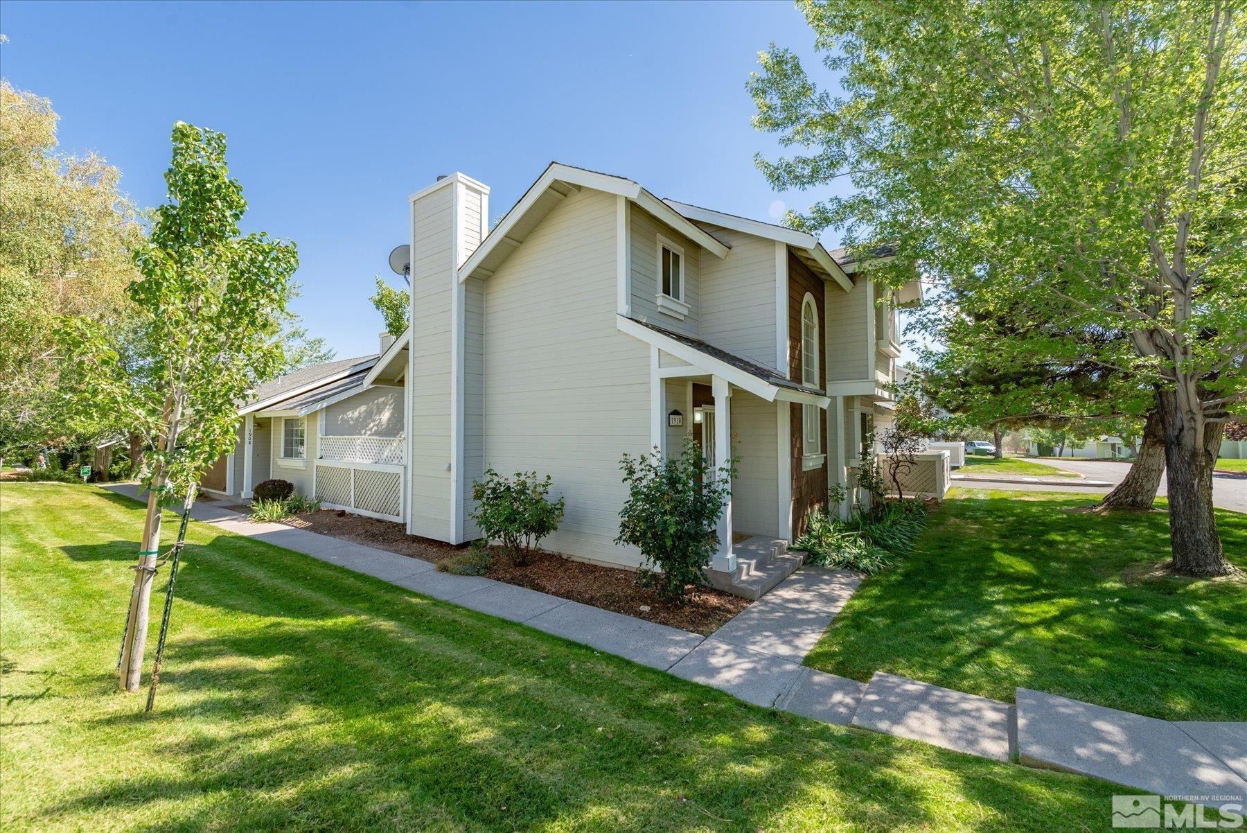 1910 Tuolumne Drive Reno, NV 89523 - Photo 3 of 36 a front view of a house with garden