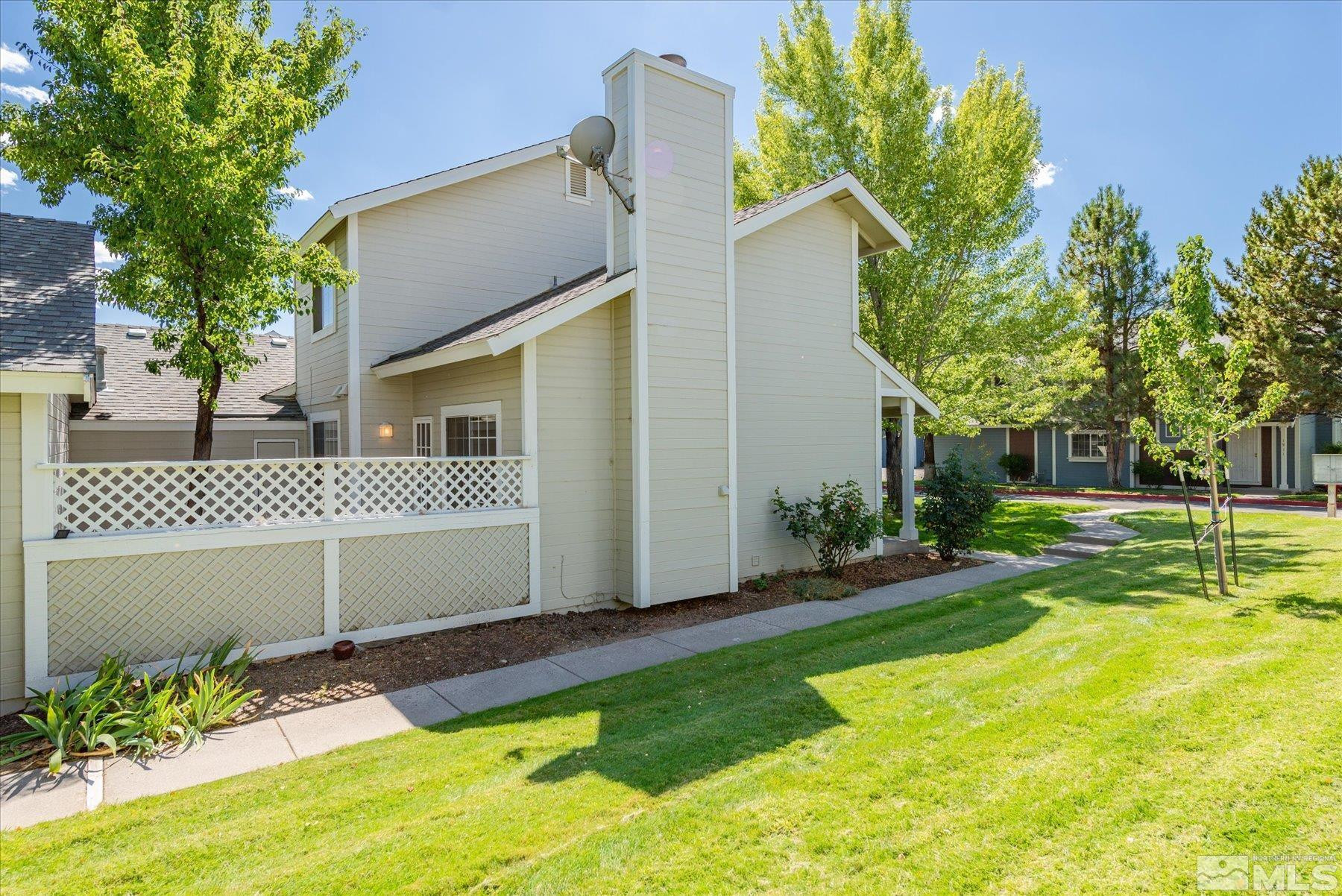1910 Tuolumne Drive Reno, NV 89523 - Photo 4 of 36 a view of a house with a yard