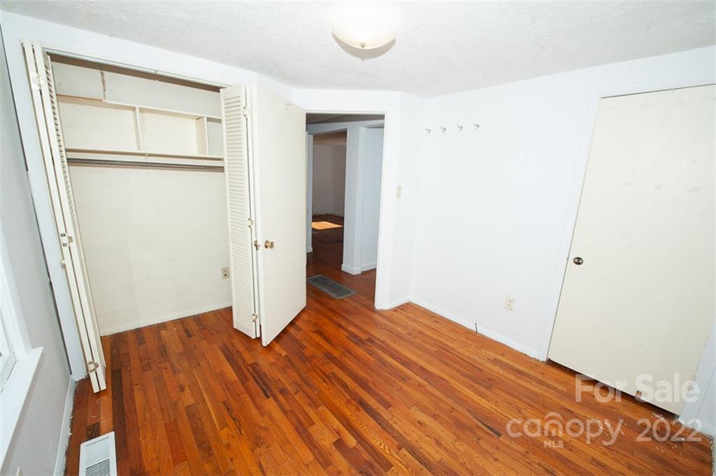 105 Smith Graveyard Road Asheville, NC 28806 - Photo 11 of 16 a view of an empty room