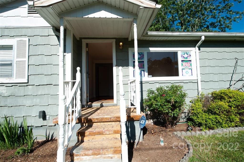 105 Smith Graveyard Road Asheville, NC 28806 - Photo 16 of 16 a view of house with outdoor space
