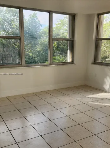 a front view of a multi story residential apartment building