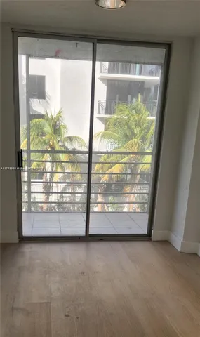 a view of empty room with front door