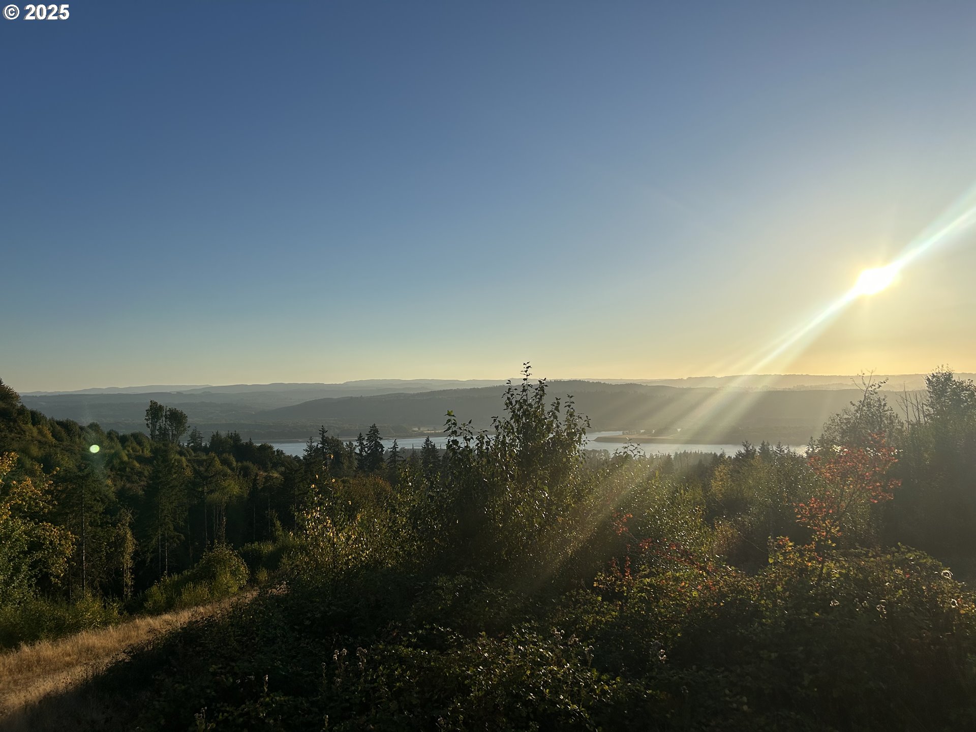 900 China Garden Road Kalama, WA 98625 - Photo 2 of 5 a view of a city street from a yard