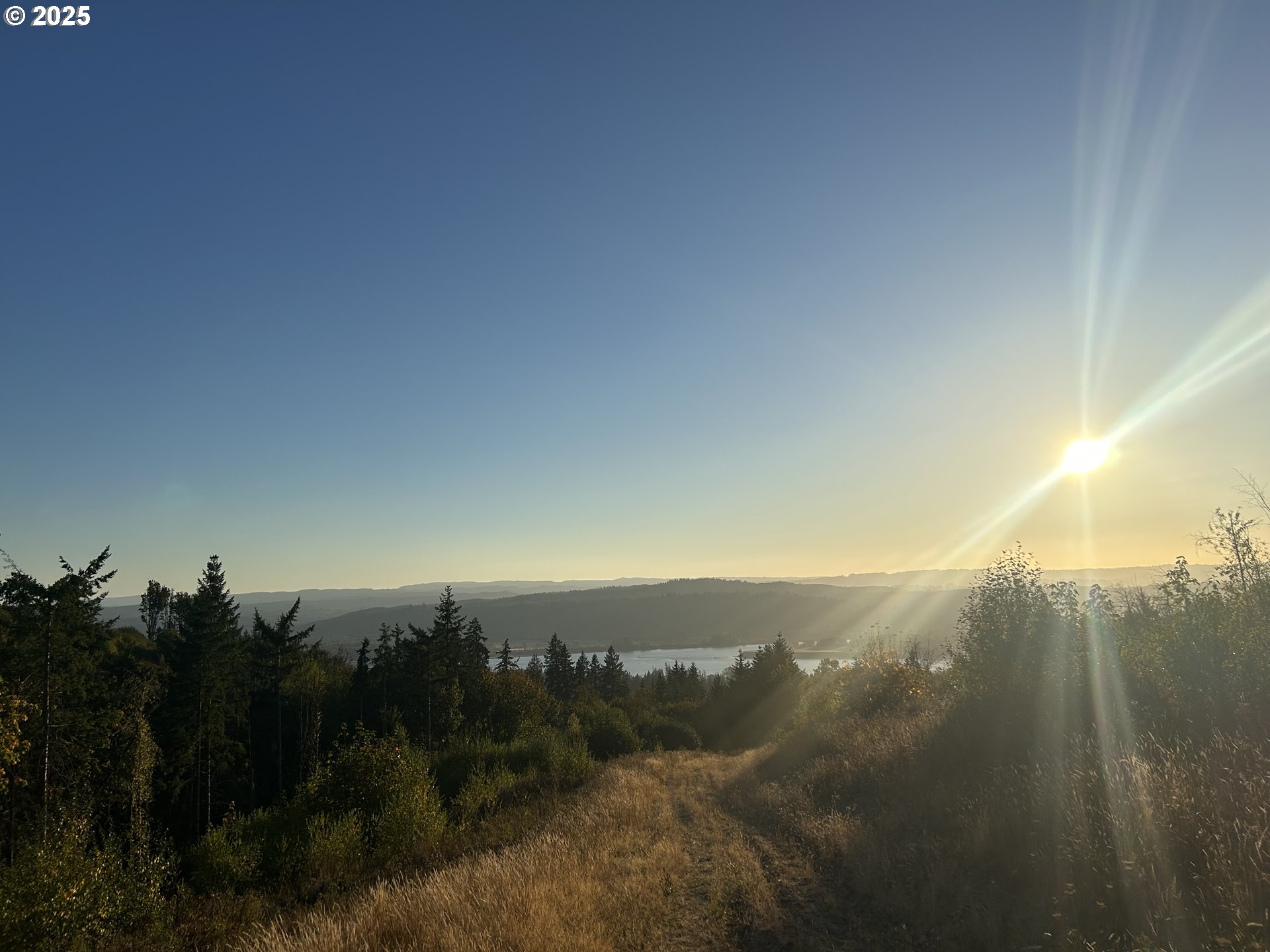 900 China Garden Road Kalama, WA 98625 - Photo 4 of 5 a view of sunset and yard