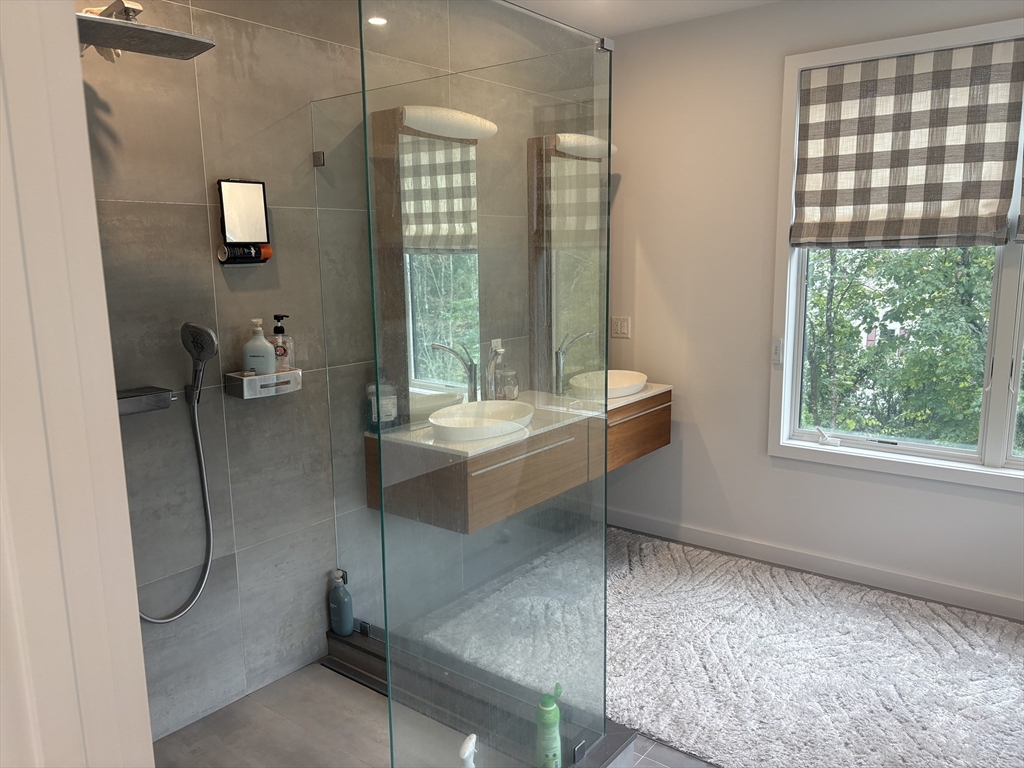 416 Conant Road Weston, MA 02493 - Photo 11 of 15 a bathroom with a sink toilet and tub