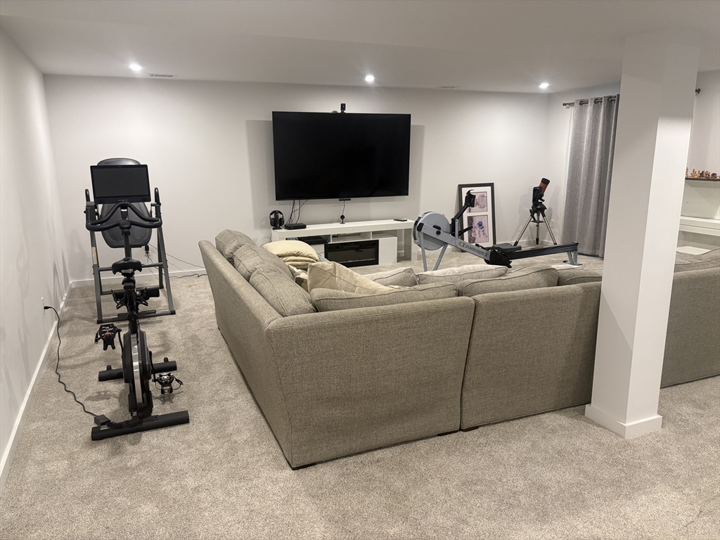 416 Conant Road Weston, MA 02493 - Photo 4 of 15 a living room with furniture and a flat screen tv