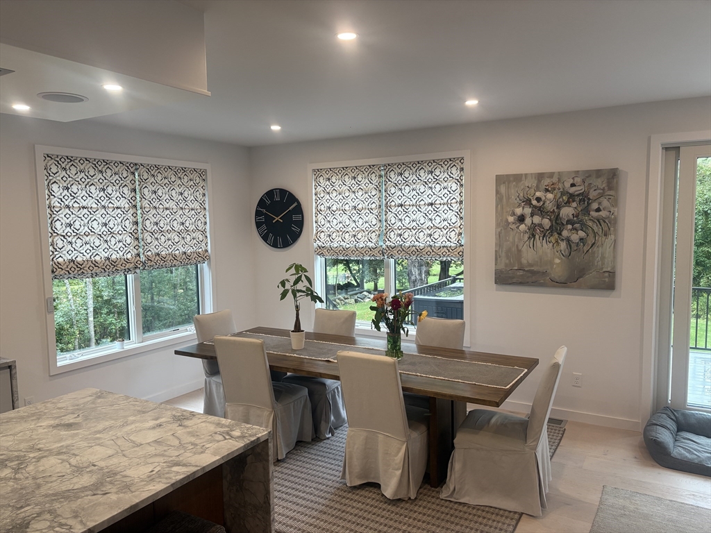 416 Conant Road Weston, MA 02493 - Photo 6 of 15 a view of a dining room with furniture window and outside view