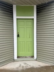 681 Millbury Street Worcester, MA 01607 - Photo 4 of 18 a view of a house with a door and a window