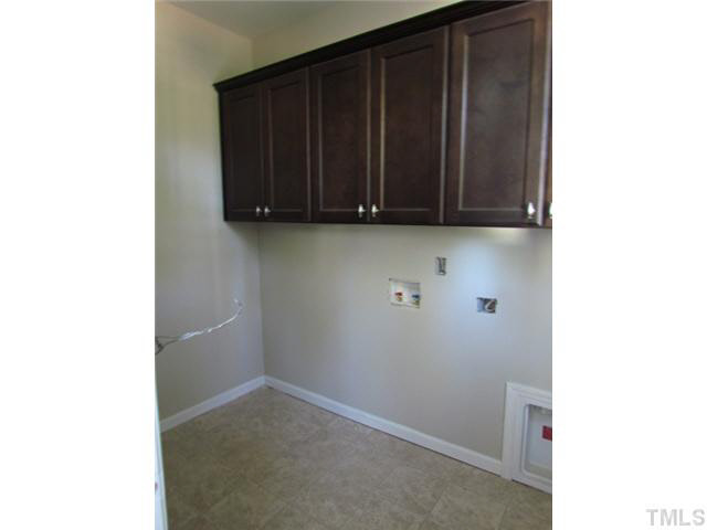 4221 Prelude Street Raleigh, NC 27616 - Photo 15 of 21 Large laundry room w/ cabinets