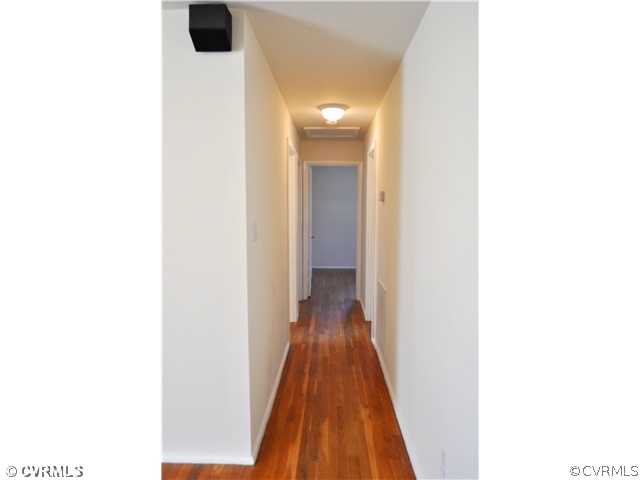 2324 Coxendale Road Chester, VA 23831 - Photo 11 of 18 a view of a hallway with wooden floor
