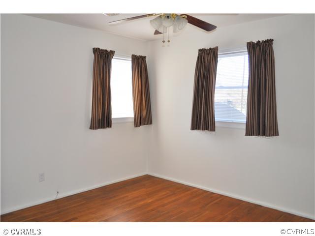 2324 Coxendale Road Chester, VA 23831 - Photo 13 of 18 a view of wooden floor and windows in a room