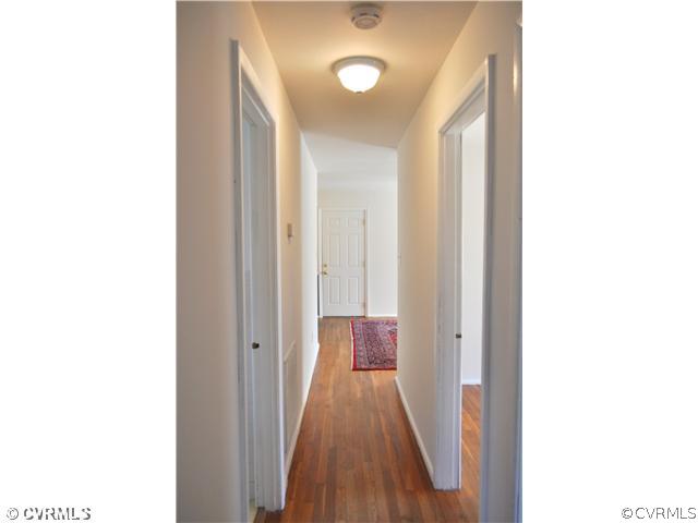 2324 Coxendale Road Chester, VA 23831 - Photo 16 of 18 a view of a room with wooden floor