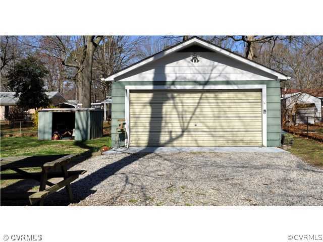 2324 Coxendale Road Chester, VA 23831 - Photo 17 of 18 a front view of a house with garden
