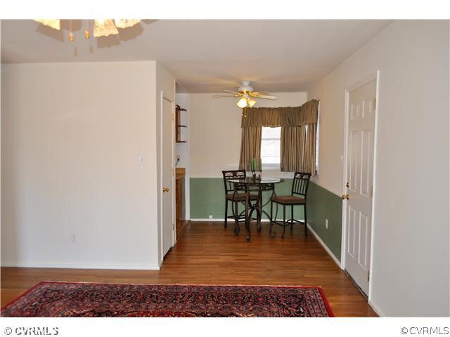 2324 Coxendale Road Chester, VA 23831 - Photo 6 of 18 a view of a dining room with furniture and a chandelier