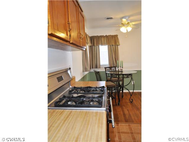 2324 Coxendale Road Chester, VA 23831 - Photo 10 of 18 a kitchen with stainless steel appliances granite countertop a sink and cabinets