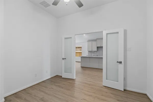 a view of storage and utility room with racks on the wall