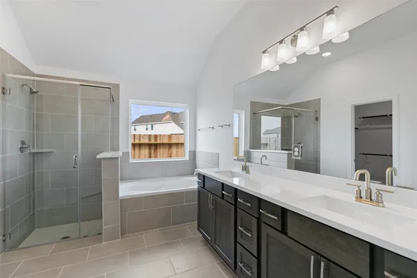 a white bath tub sitting next to a window