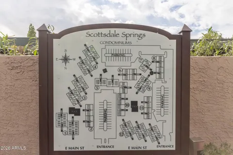 a swimming pool with outdoor seating and yard