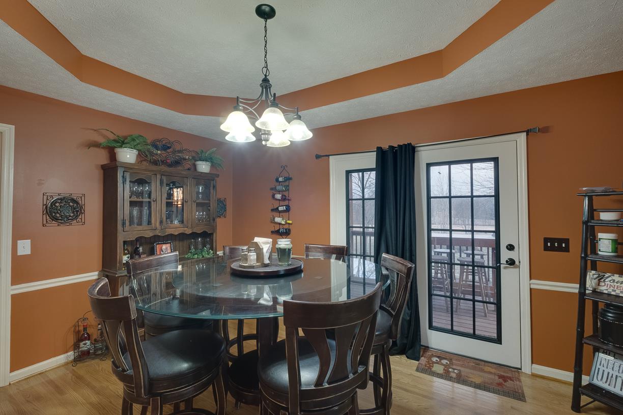 203 Link Road Cottontown, TN 37048 - Photo 19 of 30 a view of a dining room with furniture and chandelier